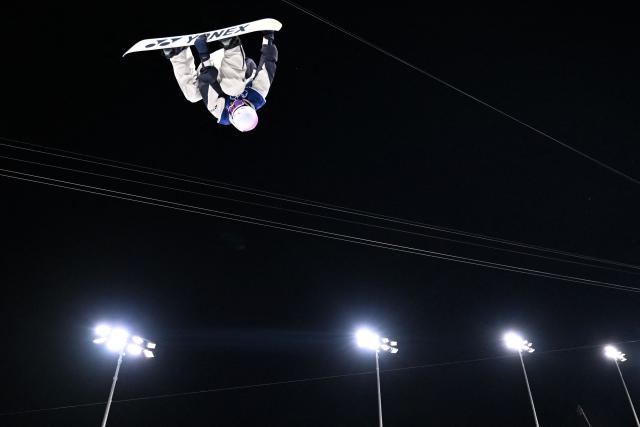 Japan's Ruka Hirano competes in the snowboard men's halfpipe final run 3 during the Milano Cortina 2026 Winter Olympic Games at Livigno Snow Park, in Livigno (Valtellina), on February 13, 2026. (Photo by Kirill KUDRYAVTSEV / AFP)