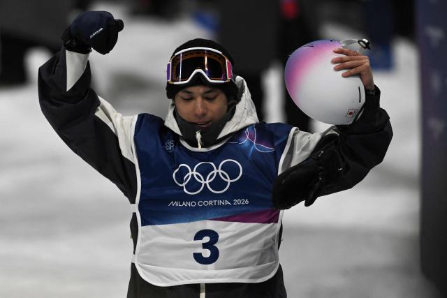 Japan's Ruka Hirano reacts after competing in the snowboard men's halfpipe final run 3 during the Milano Cortina 2026 Winter Olympic Games at Livigno Snow Park, in Livigno (Valtellina), on February 13, 2026. (Photo by Jeff PACHOUD / AFP)