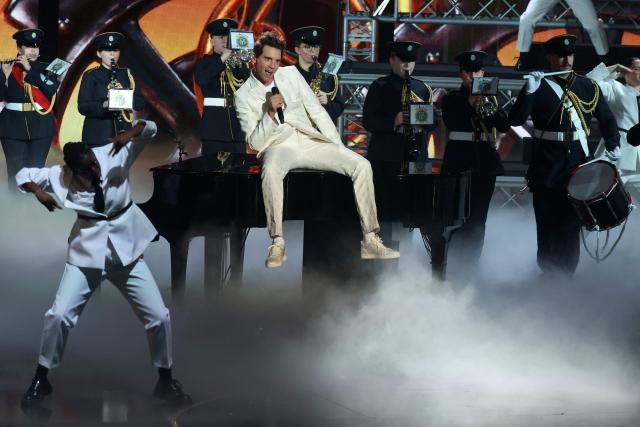 British-Lebanese singer Mika performs on stage during the Victoires de la Musique music awards ceremony at La Seine Musicale in Boulogne-Billancourt on February 13, 2026. (Photo by Alain JOCARD / AFP)