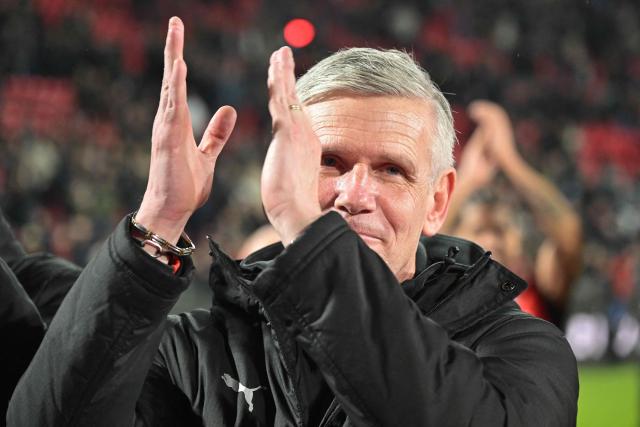 Rennes' French interim head coach Sebastien Tambouret reacts after winning at the end of the French L1 football match between Stade Rennais FC and Paris Saint-Germain (PSG) at the Roazhon Park stadium in Rennes, western France, on February 13, 2026. (Photo by Damien MEYER / AFP)