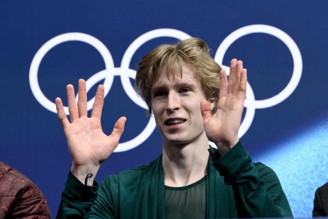 Canada's Stephen Gogolev reacts in the kiss and cry area after competing in the figure skating men's singles free skating final during the Milano Cortina 2026 Winter Olympic Games at Milano Ice Skating Arena in Milan on February 13, 2026. (Photo by WANG Zhao / AFP)