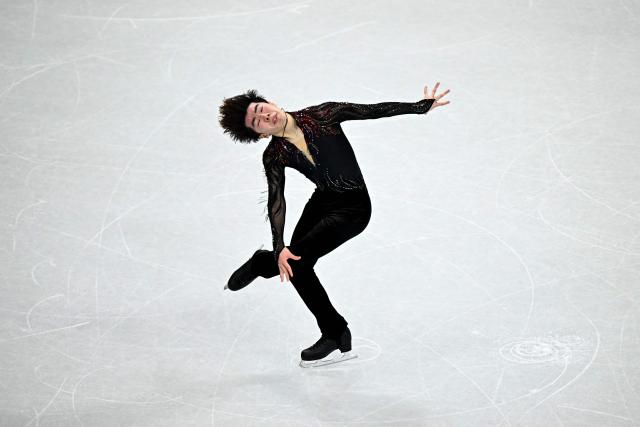 Japan's Shun Sato competes in the figure skating men's singles free skating final during the Milano Cortina 2026 Winter Olympic Games at Milano Ice Skating Arena in Milan on February 13, 2026. (Photo by Gabriel BOUYS / AFP)