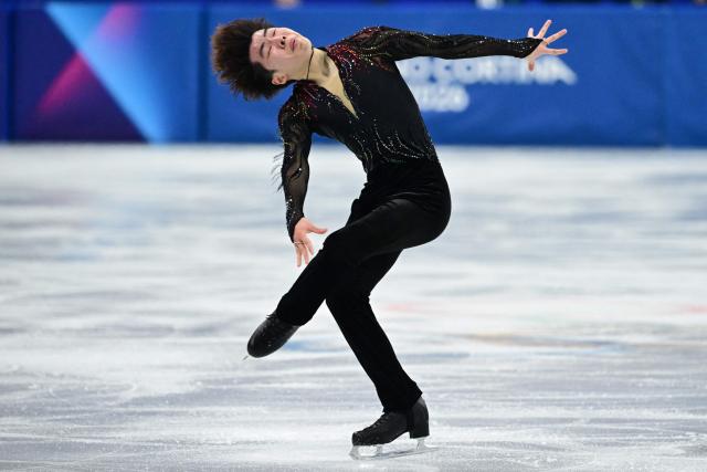 Japan's Shun Sato competes in the figure skating men's singles free skating final during the Milano Cortina 2026 Winter Olympic Games at Milano Ice Skating Arena in Milan on February 13, 2026. (Photo by Piero CRUCIATTI / AFP)
