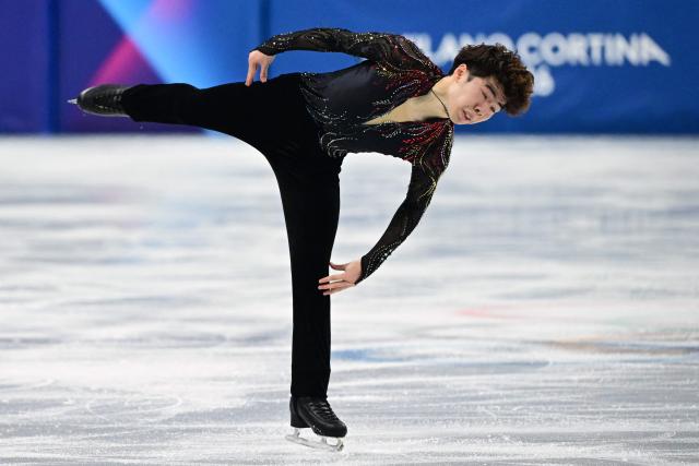 Japan's Shun Sato competes in the figure skating men's singles free skating final during the Milano Cortina 2026 Winter Olympic Games at Milano Ice Skating Arena in Milan on February 13, 2026. (Photo by Piero CRUCIATTI / AFP)