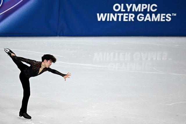 Japan's Shun Sato competes in the figure skating men's singles free skating final during the Milano Cortina 2026 Winter Olympic Games at Milano Ice Skating Arena in Milan on February 13, 2026. (Photo by Gabriel BOUYS / AFP)