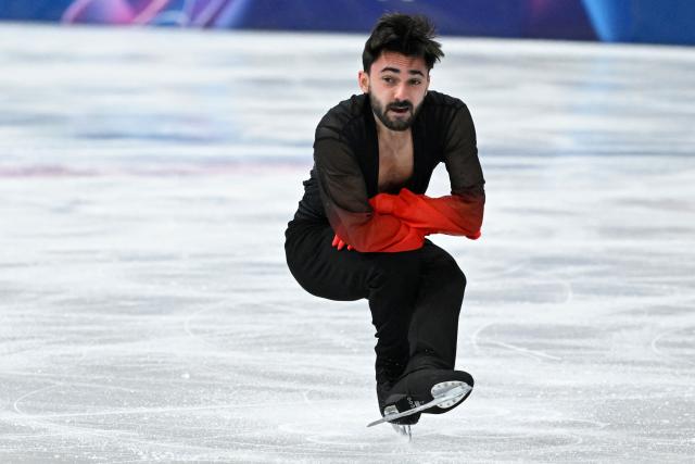 France's Kevin Aymoz competes in the figure skating men's singles free skating final during the Milano Cortina 2026 Winter Olympic Games at Milano Ice Skating Arena in Milan on February 13, 2026. (Photo by WANG Zhao / AFP)