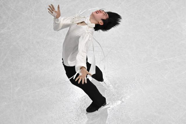 South Korea's Cha Junhwan competes in the figure skating men's singles free skating final during the Milano Cortina 2026 Winter Olympic Games at Milano Ice Skating Arena in Milan on February 13, 2026. (Photo by Antonin THUILLIER / AFP)