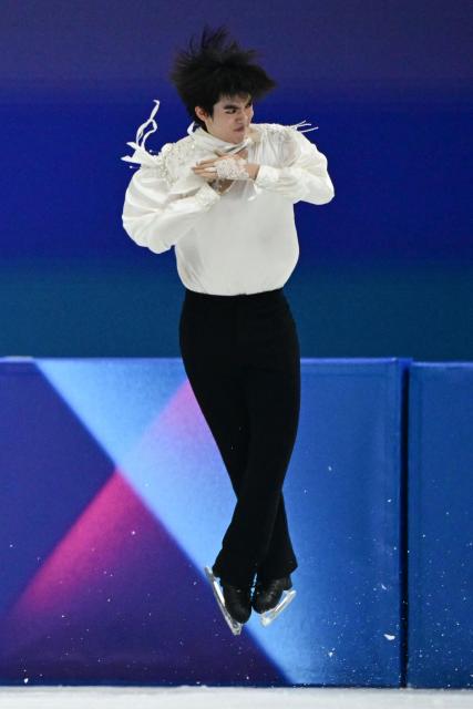 South Korea's Cha Junhwan competes in the figure skating men's singles free skating final during the Milano Cortina 2026 Winter Olympic Games at Milano Ice Skating Arena in Milan on February 13, 2026. (Photo by Piero CRUCIATTI / AFP)