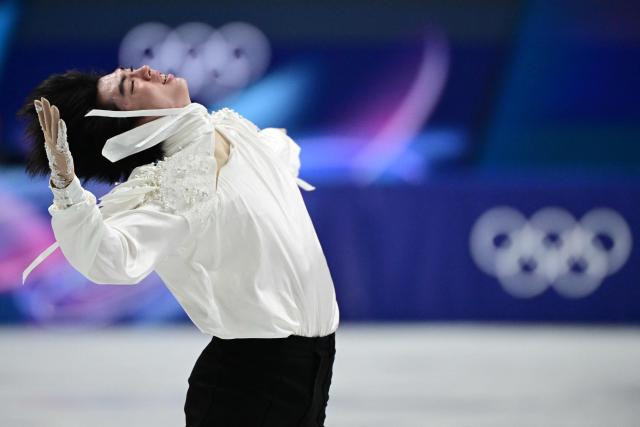 TOPSHOT - South Korea's Cha Junhwan competes in the figure skating men's singles free skating final during the Milano Cortina 2026 Winter Olympic Games at Milano Ice Skating Arena in Milan on February 13, 2026. (Photo by Piero CRUCIATTI / AFP)