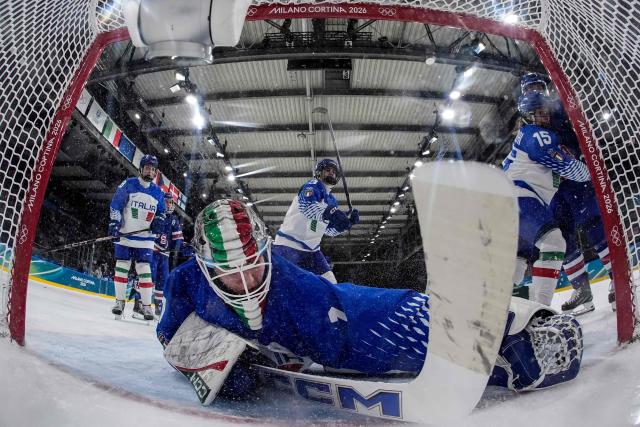 Italy's #01 Gabriella Frances Durante makes a save during the women's quarter final Ice Hockey match between USA and Italy at the Milano Rho Ice Hockey Arena at the Milano Cortina 2026 Winter Olympic Games in Milan, on February 13, 2026. (Photo by Darko Bandic / POOL / AFP)