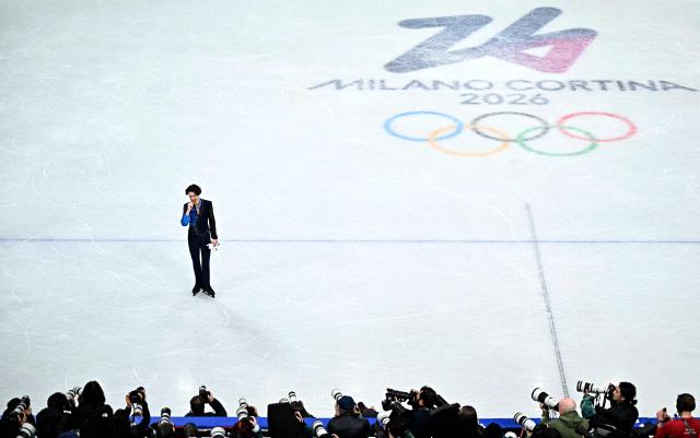 Gold medallist Kazakhstan's Mikhail Shaidorov poses after the victory ceremony of the figure skating men's singles free skating final during the Milano Cortina 2026 Winter Olympic Games at Milano Ice Skating Arena in Milan on February 13, 2026. (Photo by Gabriel BOUYS / AFP)