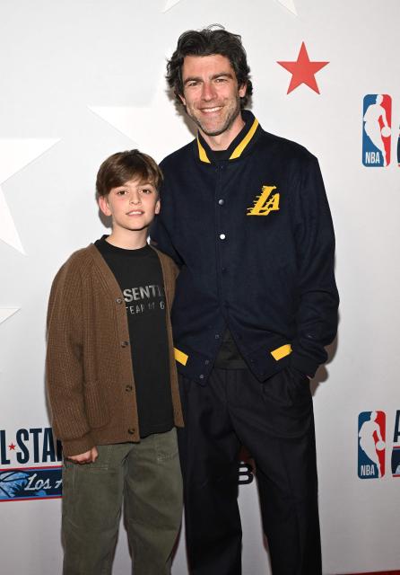 US actor Max Greenfield and son Ozzie Greenfield attend the NBA All-Star Legendary Tip-Off Celebration at the LACMA in Los Angeles, February 13, 2026. (Photo by LISA O'CONNOR / AFP)