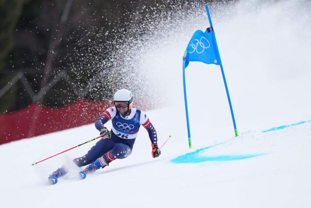 USA's Ryder Sarchett competes in the first run of the men's giant slalom alpine skiing event during the Milano Cortina 2026 Winter Olympic Games at the Stelvio Ski Centre in Bormio (Valtellina) on February 14, 2026. (Photo by Dimitar DILKOFF / AFP)