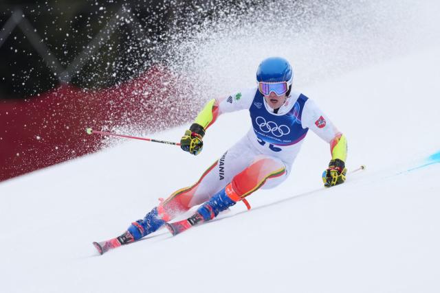 Lithuania's Andrej Drukarov competes in the first run of the men's giant slalom alpine skiing event during the Milano Cortina 2026 Winter Olympic Games at the Stelvio Ski Centre in Bormio (Valtellina) on February 14, 2026. (Photo by Dimitar DILKOFF / AFP)