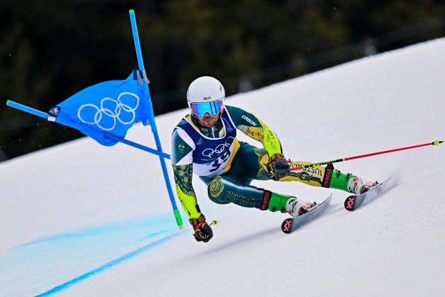 Australia's Harry Laidlaw passes a gate in the first run of the men's giant slalom alpine skiing event during the Milano Cortina 2026 Winter Olympic Games at the Stelvio Ski Centre in Bormio (Valtellina) on February 14, 2026. (Photo by Fabrice COFFRINI / AFP)