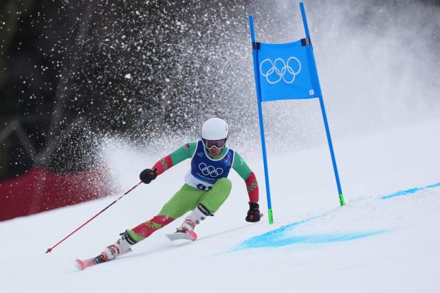 Kenya's Issa Gachingiri Laborde Dit Pere competes in the first run of the men's giant slalom alpine skiing event during the Milano Cortina 2026 Winter Olympic Games at the Stelvio Ski Centre in Bormio (Valtellina) on February 14, 2026. (Photo by Dimitar DILKOFF / AFP)
