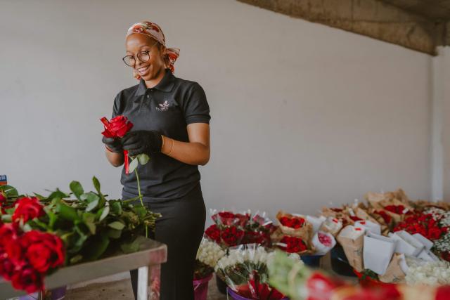 Lauryne from Wild Flower Gifting prepares a rose bouquet for delivery on the eve of Valentine’s Day in Nairobi, on February 13, 2026. (Photo by Fredrik Lerneryd / AFP)