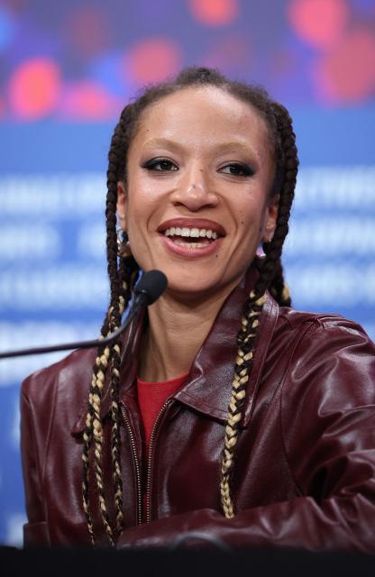 French actress D’Johй Kouadio attends a press conference for the film "Dao" presented in competition at the 76th Berlinale, Europe's first major film festival of the year, in Berlin on February 14, 2026. (Photo by Ronny HARTMANN / AFP)