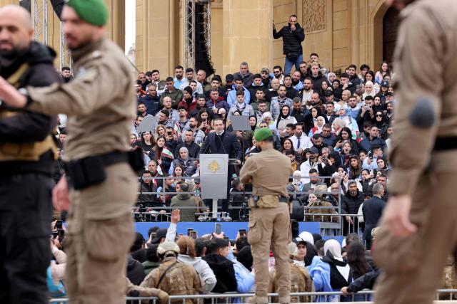 Saad Hariri (C), former Lebanese prime minister and the son of the late premier Rafic Hariri, addresses a rally marking the 21st anniverary of his father's assassination, at Martyrs’ Square in central Beirut on February 14, 2026. Supporters and political figures attended a rally marking the anniversary where his son delivered a speech at his gravesite, recalling his political legacy and reaffirming commitment to national principles. (Photo by ANWAR AMRO / AFP)
