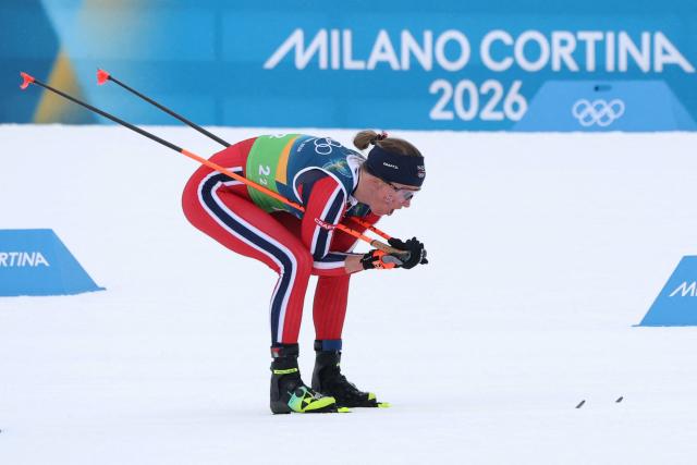 Norway's Astrid Oeyre Slind competes during the cross-country women's 4 x 7,5km relay event of the Milano Cortina 2026 Winter Olympic Games at Tesero Cross-Country Skiing Stadium in Lago di Tesero (Val di Fiemme), on February 14, 2026. (Photo by Anne-Christine POUJOULAT / AFP)