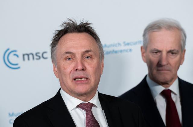 Norway's Defence Minister Tore O. Sandvik (L) and Norway's Prime Minister Jonas Gahr Store look on during a Signing Ceremony between Germany and Norway during the 62nd Munich Security Conference (MSC) on February 14, 2026 in Munich, southern Germany.  (Photo by Michael BIHLMAYER / POOL / AFP)