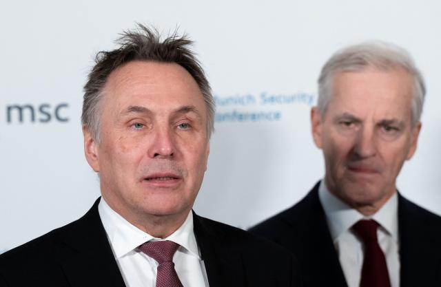 Norway's Defence Minister Tore O. Sandvik (L) and Norway's Prime Minister Jonas Gahr Store look on during a Signing Ceremony between Germany and Norway during the 62nd Munich Security Conference (MSC) on February 14, 2026 in Munich, southern Germany.  (Photo by Michael BIHLMAYER / POOL / AFP)