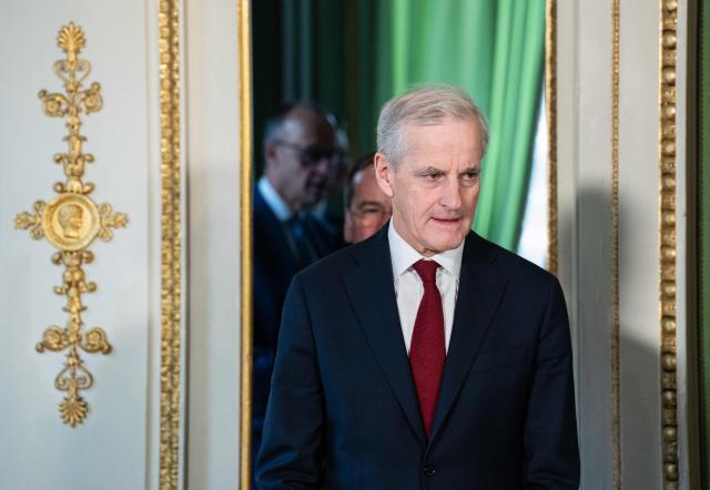 Norway's Prime Minister Jonas Gahr Store enters the for a Signing Ceremony between Norway and Germany during the 62nd Munich Security Conference (MSC) on February 14, 2026 in Munich, southern Germany.  (Photo by Michael BIHLMAYER / POOL / AFP)