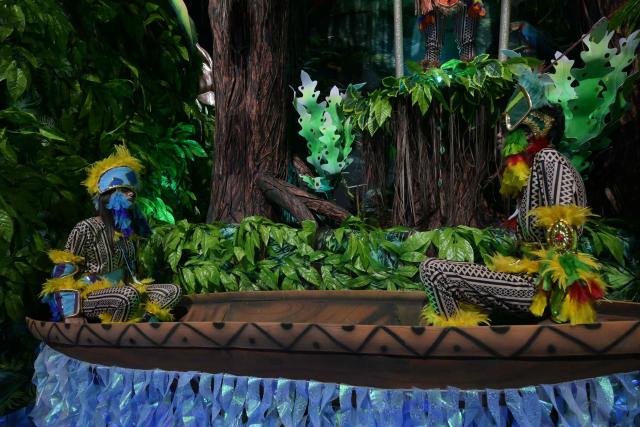 Revellers of the Academicos do Tatuape samba school perform during the carnival parade at the Anhembi Sambadrome in Sao Paulo, Brazil, on February 14, 2026. (Photo by NELSON ALMEIDA / AFP)