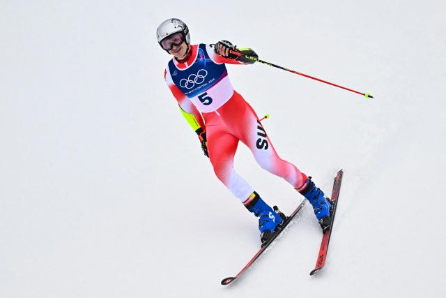 Switzerland's Marco Odermatt reacts after the second run of the men's giant slalom alpine skiing event during the Milano Cortina 2026 Winter Olympic Games at the Stelvio Ski Centre in Bormio (Valtellina) on February 14, 2026. (Photo by Fabrice COFFRINI / AFP)