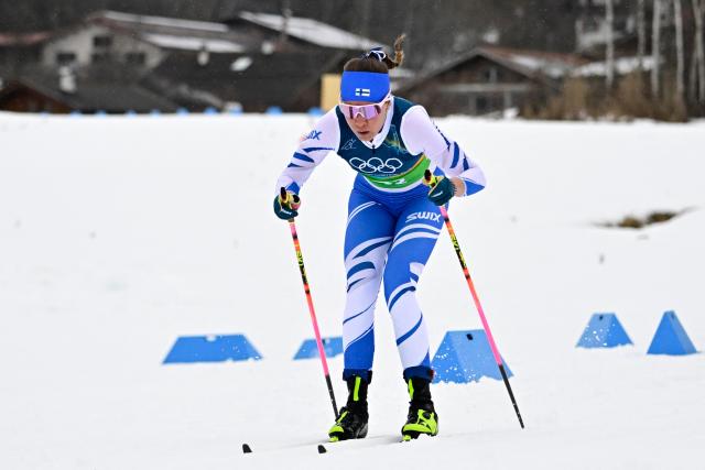 Finland's Kerttu Niskanen competes during the cross-country women's 4 x 7,5km relay event of the Milano Cortina 2026 Winter Olympic Games at Tesero Cross-Country Skiing Stadium in Lago di Tesero (Val di Fiemme), on February 14, 2026. (Photo by Tobias SCHWARZ / AFP)
