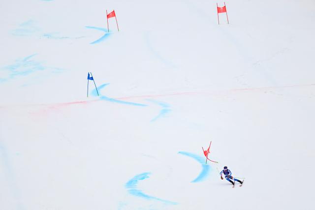 France's Leo Anguenot competes in the second run of the men's giant slalom alpine skiing event during the Milano Cortina 2026 Winter Olympic Games at the Stelvio Ski Centre in Bormio (Valtellina) on February 14, 2026. (Photo by Fabrice COFFRINI / AFP)