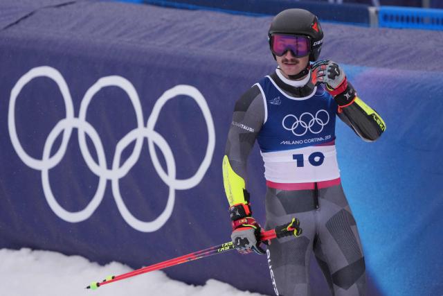 Austria's Patrick Feurstein reacts in the finish area after competing in the second run of the men's giant slalom alpine skiing event during the Milano Cortina 2026 Winter Olympic Games at the Stelvio Ski Centre in Bormio (Valtellina) on February 14, 2026. (Photo by Dimitar DILKOFF / AFP)