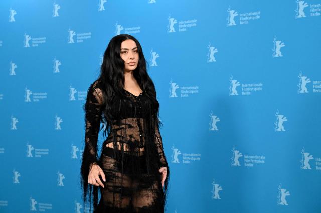 British actress Charli xcx poses during a photocall for the film 'The Moment' presented in the Panorama section at the 76th Berlinale, Europe's first major film festival of the year, in Berlin on February 14, 2026. (Photo by RALF HIRSCHBERGER / AFP)