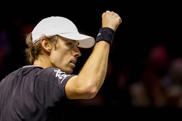 Australia's Alex de Minaur celebrates after defeating France's Ugo Humbert during the semi-finals of the Rotterdam tennis tournament at Rotterdam Ahoy, on February 14, 2026. (Photo by Bas CZERWINSKI / ANP / AFP) / Netherlands OUT