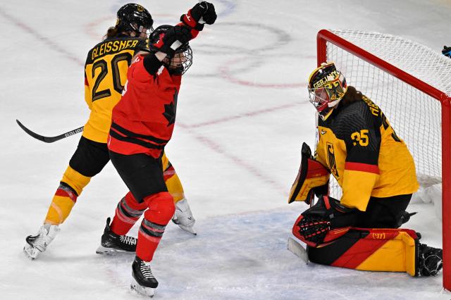 Germany's #35 Sandra Abstreiter reacts after Canada's forward #10 Sarah Fillier (out of frame) scores her team's third goal during the women's quarter final ice hockey match between Canada and Germany at the Milano Rho Ice Hockey Arena at the Milano Cortina 2026 Winter Olympic Games in Milan, on February 14, 2026. (Photo by Alexander NEMENOV / AFP)