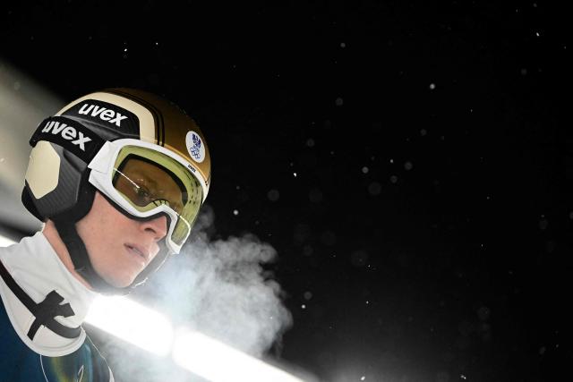 Austria's Jan Hoerl reacts prior to jumping during the trial round of the men's large hill individual ski jumping of the Milano Cortina 2026 Winter Olympic Games at Predazzo Ski Jumping Stadium in Predazzo (Val di Fiemme), on February 14, 2026. (Photo by Tobias SCHWARZ / AFP)