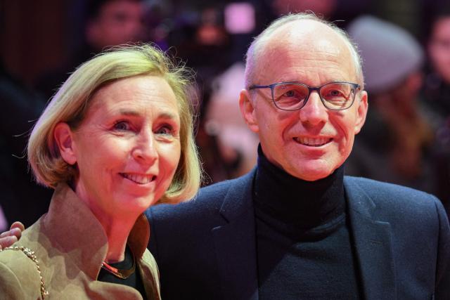 Luxembourg's Prime Minister Luc Frieden and his wife Marjolijne Drooglever-Fortuyn attend the 76th Berlinale, Europe's first major film festival of the year, in Berlin on February 14, 2026. (Photo by RALF HIRSCHBERGER / AFP)