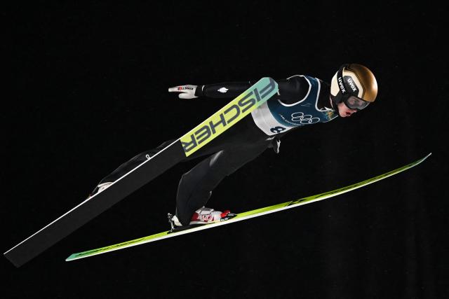 France's Jules Chervet jumps during the 1st round of the men's large hill individual ski jumping of the Milano Cortina 2026 Winter Olympic Games at Predazzo Ski Jumping Stadium in Predazzo (Val di Fiemme), on February 14, 2026. (Photo by Javier SORIANO / AFP)