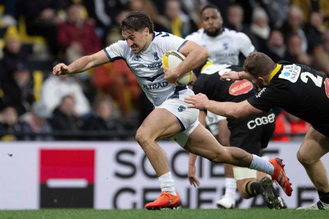 French centre Auguste Cadot runs with the ball during the French Top14 rugby union match between Stade Rochelais (La Rochelle) and Montpellier Herault Rugby at The Marcel-Deflandre Stadium in La Rochelle, western France on February 14, 2026. (Photo by XAVIER LEOTY / AFP)
