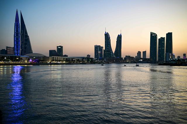 High rise buildings are pictured in the Manama skyline on February 14, 2026. (Photo by Giuseppe CACACE / AFP)