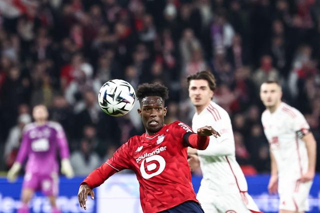 Lille's Portuguese forward #27 Felix Correia heads the ball during the French L1 football match between LOSC Lille and Stade Brestois 29 at the Stade Pierre-Mauroy in Villeneuve-d'Ascq, northern France, on February 14, 2026. (Photo by Sameer Al-DOUMY / AFP)