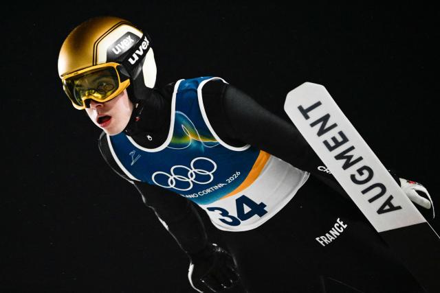 France's Valentin Foubert jumps during the final round of the men's large hill individual ski jumping of the Milano Cortina 2026 Winter Olympic Games at Predazzo Ski Jumping Stadium in Predazzo (Val di Fiemme), on February 14, 2026. (Photo by Tobias SCHWARZ / AFP)
