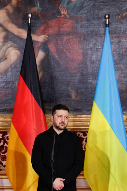 Ukrainian President Volodymyr Zelensky gives a press statement at the Munich Residence palace, prior to the traditional dinner on the occasion of the Munich Security Conference (MSC), on February 14, 2026 in Munich, southern Germany. (Photo by Michaela STACHE / AFP)