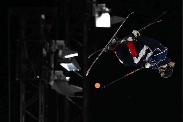 France's Kim Dumont Zanella competes in the freestyle skiing women's freeski big air qualification run 2 during the Milano Cortina 2026 Winter Olympic Games at Livigno Snow Park - Big Air, in Livigno (Valtellina), on February 14, 2026. (Photo by Jeff PACHOUD / AFP)