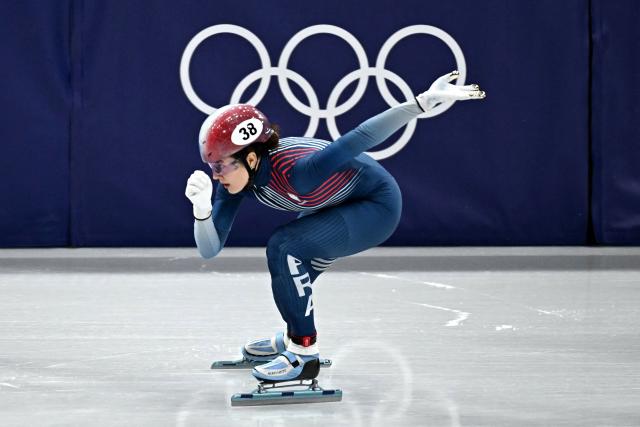 France's Cloe Ollivier competes in the short track speed skating women's 1000m heats during the Milano Cortina 2026 Winter Olympic Games at Milano Ice Skating Arena in Milan on February 14, 2026. (Photo by Gabriel BOUYS / AFP)