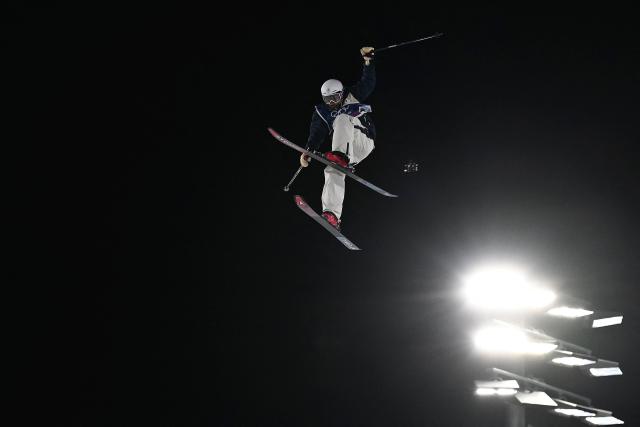 Japan's Yuna Koga competes in the freestyle skiing women's freeski big air qualification run 2 during the Milano Cortina 2026 Winter Olympic Games at Livigno Snow Park - Big Air, in Livigno (Valtellina), on February 14, 2026. (Photo by Jeff PACHOUD / AFP)