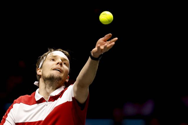 Kazakhstan's Alexander Bublik serves to Canada's Felix Auger-Aliassime during the quarterfinals of the Rotterdam tennis tournament at Rotterdam Ahoy, on February 14, 2026. (Photo by Bas CZERWINSKI / ANP / AFP) / Netherlands OUT