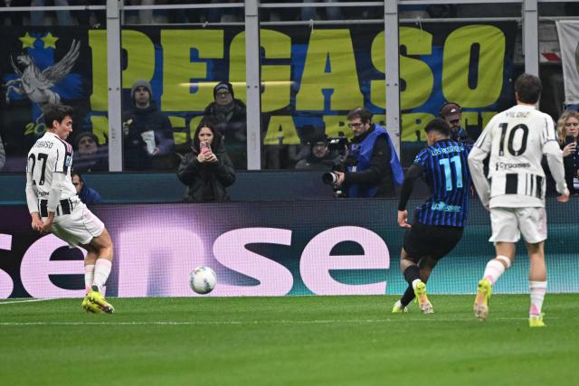 Inter Milan's Brazilian forward #11 Luis Henrique scores his team's first goal during the Italian Serie A football match between Inter Milan and Juventus at the San Siro Stadium in Milan, on February 14, 2026. (Photo by Piero CRUCIATTI / AFP)