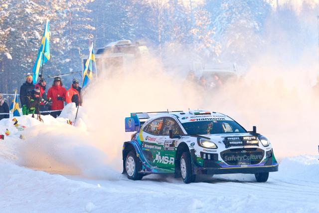 Irish driver Jon Armstrong, and Irish co-driver Shane Byrne compete in their Ford Puma Rally1 during Rally Sweden, the second round of the FIA World Rally Championship in Umea, Sweden, on February 14, 2026. (Photo by Peo MOLLER / TT News Agency / AFP) / Sweden OUT