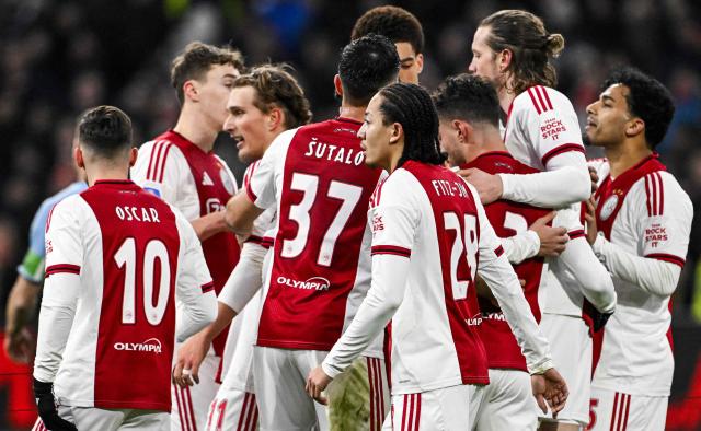 Ajax' players celebrate the 4-1 goal during the Dutch Eredivisie football match between AZ Alkmaar and Ajax Amsterdam at AFAS Stadion in Alkmaar on February 8, 2026. (Photo by Olaf Kraak / ANP / AFP) / Netherlands OUT